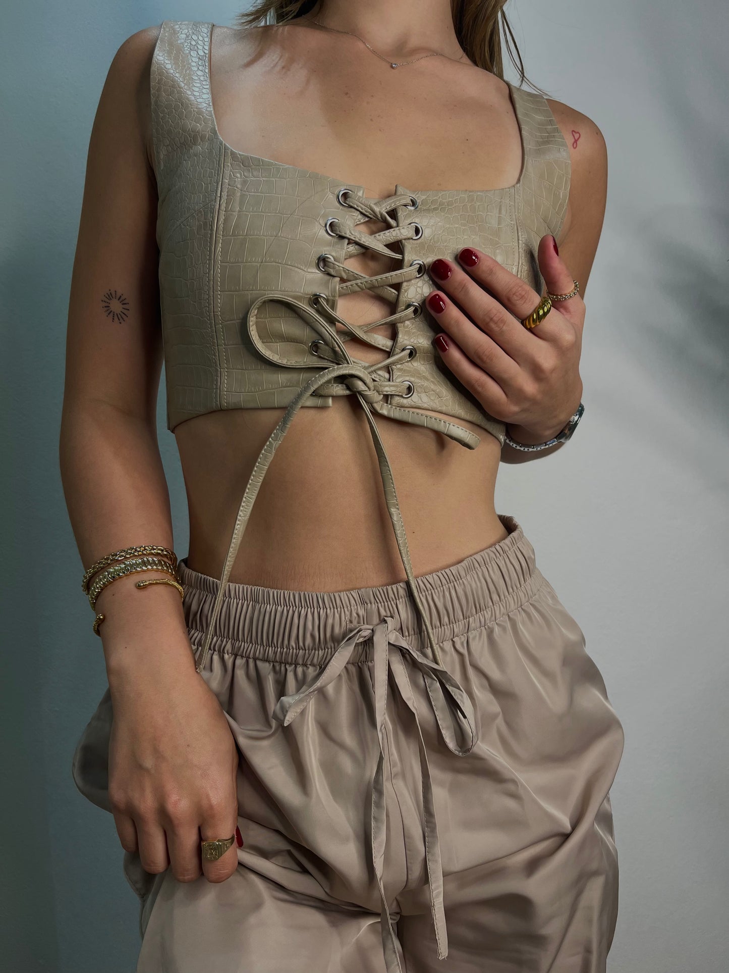 Laced leather crop top